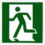 Running Man exit sign in alternate design of the running man pictorial element, which differs from the traditional Japanese style, man is moving to left through a doorway